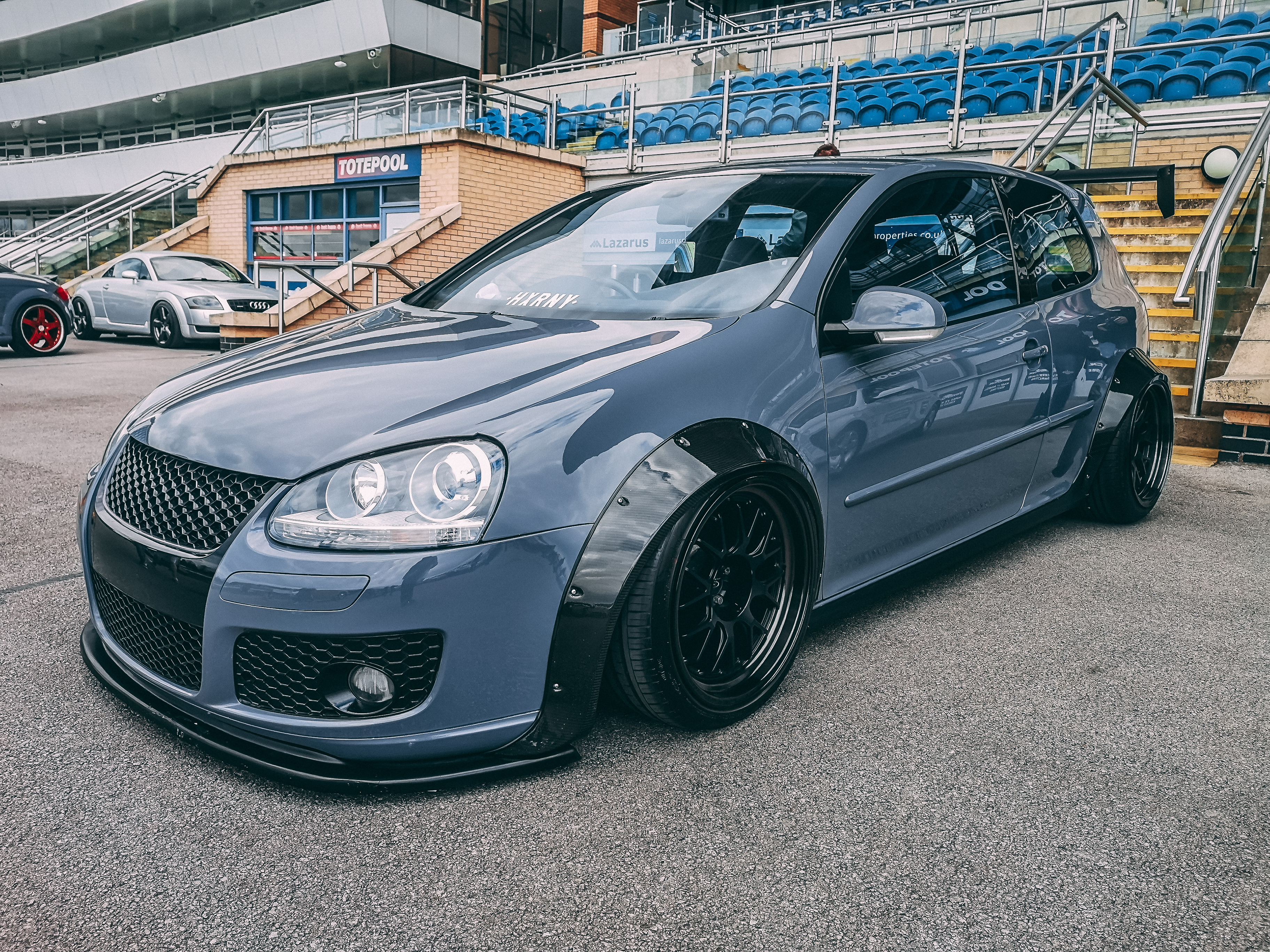 Grey MK5 Golf with Rocket Bunny Arches